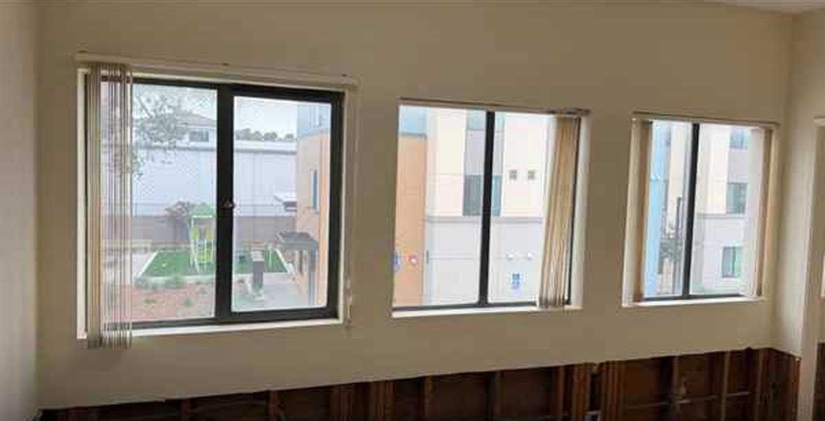 Corner office with windows on two walls